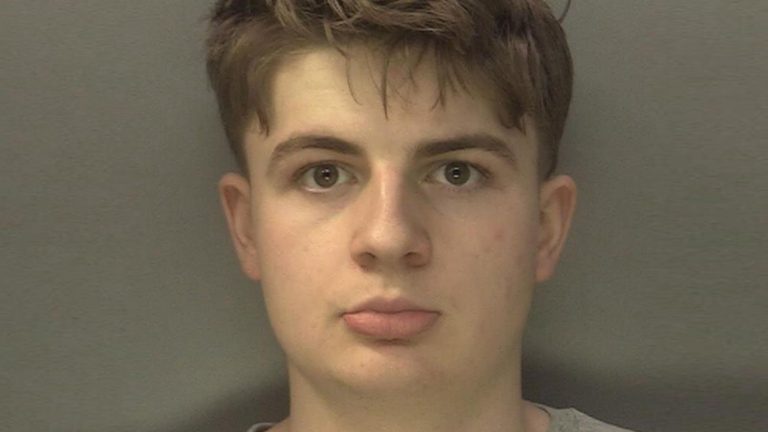 A mugshot of Benjamin Day looking at the camera. He has brown eyes and brown hair.