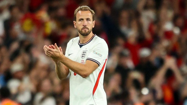 Harry Kane applauds the fans