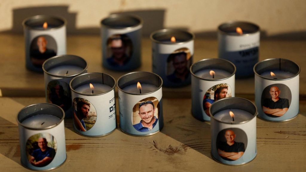 Candles are let to remember those killed at Kibbutz Kfar Aza, on the third anniversary of the Hamas-led attack on Israel on 7 October 2023, in Kfar Aza, southern Israel (7 October 2026)