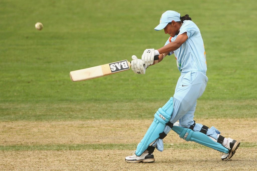 Harmanpreet Kaur of India hits a six during the ICC Women's World Cup 2009 Super Six match between Australia and India at North Sydney Oval on March 14, 2009 in Sydney, Australia.