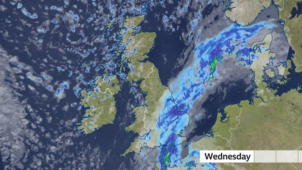 Map of UK showing where rain will fall on Wednesday. A swathe of blue shows persistent rain covering much of southern and eastern England.